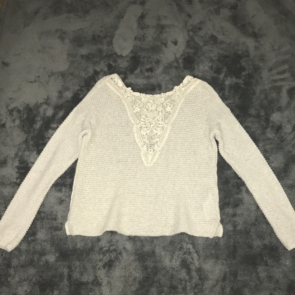 Knit sweater.